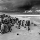 Cloudy beach Die Damme