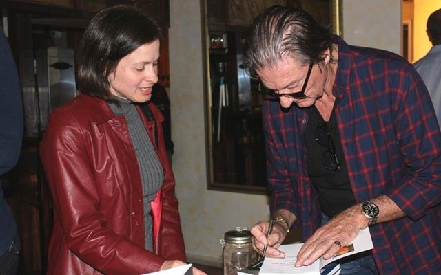 Richard Peirce, with Brenda du Toit left, signed all books purchased during the marine evening.