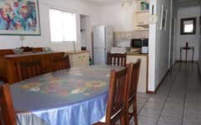 Dining room and kitchen Dining room and kitchen