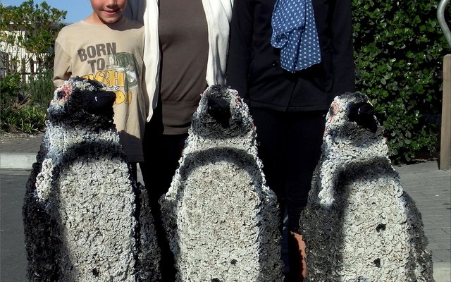 Christopher Nimb (8), Sylvie Agenbach and Tahlia Nimb (12) after re-painted the previous “Fees van die Ganse” African Penguins for the festival.