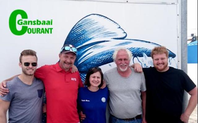 The Revs Per Minute film team visited Gansbaai and Hermanus on a road trip for Avis Southern Africa.  The well-known personality, Sasha Martinengo, joined the road trip and they were travelling in a  Volkswagen, corporate sponsor of the Dyer Island Conservation Trust (DICT). They decided to visit the Trust’s African Penguin and Seabird Sanctuary (APSS). They also took a trip on board Dream Catcher with Dyer Island Cruises where they enjoyed the marine wildlife of our Dyer Island ecosystem.  Local and uncle to Sasha, Italo Martinego, stopped in for a quick hello to his nephew. From ltr Ronald le Roux, Sasha Martinengo, Brenda du Toit, Jan Sime and Ian Sime.