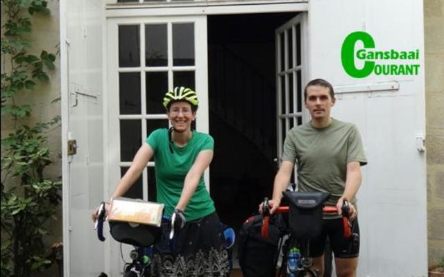 Scott Harvey and Sarah Tyler in front of their home in Paris, France before they started their more than 30,000 kilometer cycle journey.