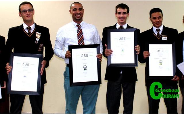 Gansbaai Academia’s Stock Exchange stars are from left: Jacques Prins, Heinrich van der Merwe, Mr Wilton Phillips, André Lourens, Llewellyn Davids and the principal, Mr Tommy Wilson.