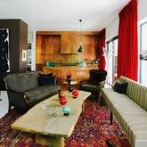 Lounge towards copper cladded kitchen