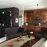 lounge detail towards copper cladded kitchen