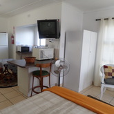 Unit 2: double bed, en-suite bathroom and kitchen