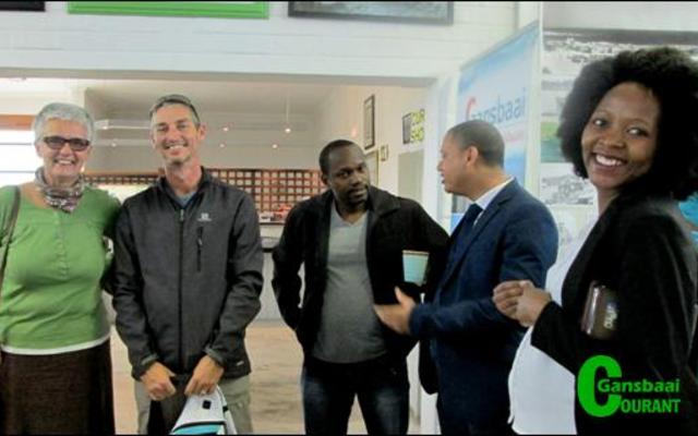 Perdita du Bois (Fynbos Retreat), Brenhan van Niekerk (tour operator), and local guest house representatives: Blessed Ndiweni,  Sean  Petersen  and  Kate  Mguni  in discussion at Gansbaai Tourism.