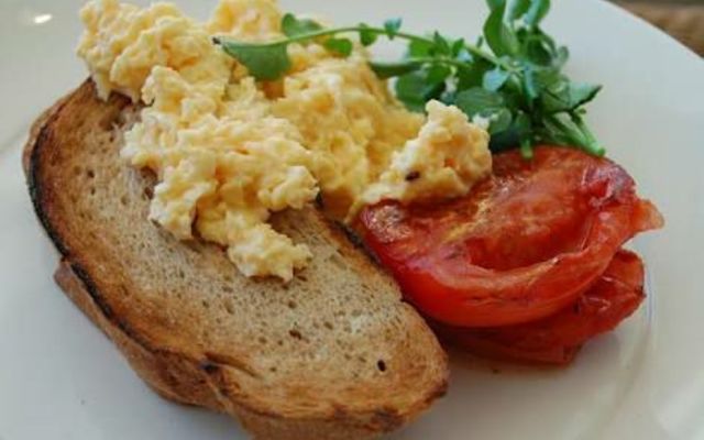 Croissant with egg and tomato Croissant with egg and tomato