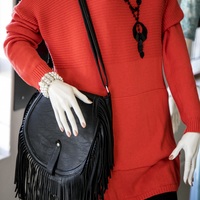 Fashionable red blouse with black handbag