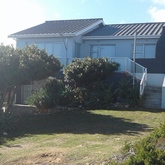 Very neat double storey house with sea views and outside braai on a nice stoep.