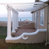 Sea view and space, outside braai under roof. Parking for boats also.