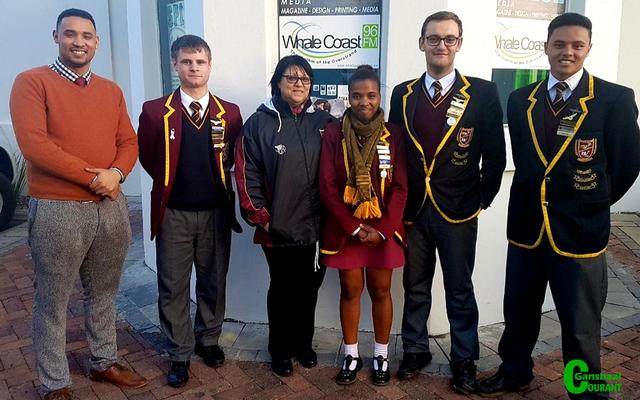 Gansbaai Academia’s Team G-Force find themselves among the top 6 schools participating in the National CharterQuest CFO Junior Competition. This photo was taken after their interview with WhaleCoast FM. From left Wilton Phillips (Mentor and Accounting teacher), Jacques Prins, Mona Matthews (English teacher), Khanya Xalisile, Heinrich van der Merwe and Llewellyn Davids.    