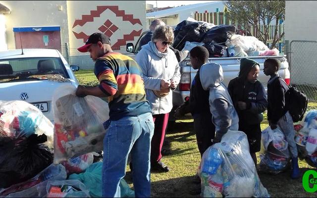 Happiness at the Eluxolweni swop shop where the children received tokens for their recyclable materials to buy stationary supplies, personal hygiene items and even some toys and clothes.  