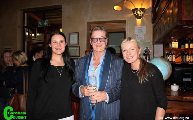 A joyful moment for Kelly Baker (left), Marine Dynamics: Marine biologist and Alison Towner (right), Dyer Island Conservation Trust: White shark biologist, with Richard Peirce, author of the book, ‘Nicole’ - A true story of a white shark’s journey.