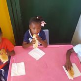 Mickyla Groenewald en vriende het vir die kinders by Rainbow kids beferf met kos en geskenkies.