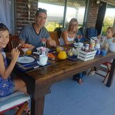 Linares family enjoying breakfast