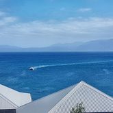 View from upstairs patio. Note the whale close to the rocks.