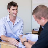 Pieter assisting client 