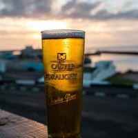 Beer with sunset backround