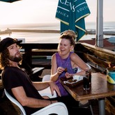 Clients enjoying food & drinks