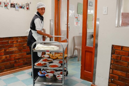 Elim_home_staff_delivering_lunch_1518417496