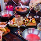 Clients enjoying food & wine