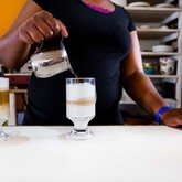 Staff preparing Caffè lattes