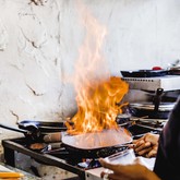 Staff preparing pepper sauce