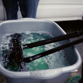 Water for washing windscreens