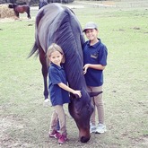 Two of our little riders sporting out Riding School Shirts sponsored by Overberg Agri Stanford