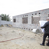 Inspecting building work