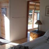 Great White bedroom with attached kitchen and private entrance.