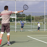 Playing tennis