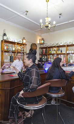 bredasdorp_accommodation_victoria_hotel_enjoying_a_drink_at_the_bar_1556634051