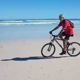 Gansbaai - Amazing Grace B&B - riding bicycle by the sea