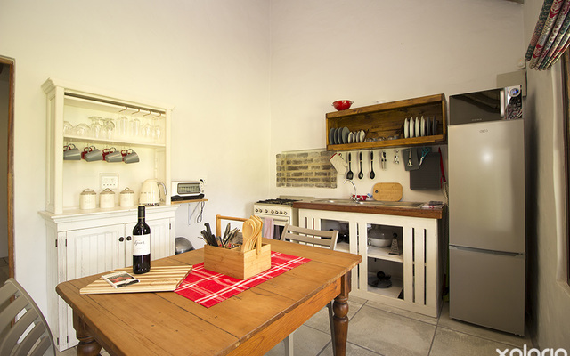 kleinmond_accommodation_njr_cottage_kitchen_with_dining_room_table_1537944538_1567425772