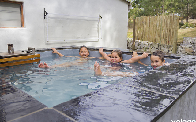 kleinmond_accommodation_njr_nuwejaarsfarm_chilling_at_heated_pool_1558592663_1568725565