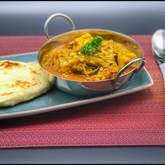 Range of curries, roti and naan