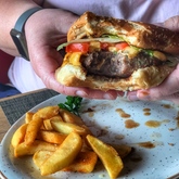 Gourmet burger in brown or white bun - beef, fish and chicken