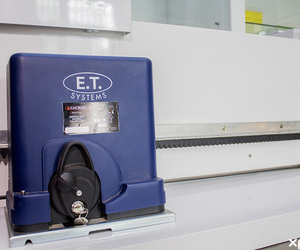 What does an automatic electric gate service include?