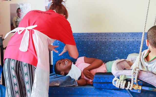 Elim_home_volunteer_interacting_with_girl_1518417940_1573474962 Elim_home_volunteer_interacting_with_girl_1518417940_1573474962