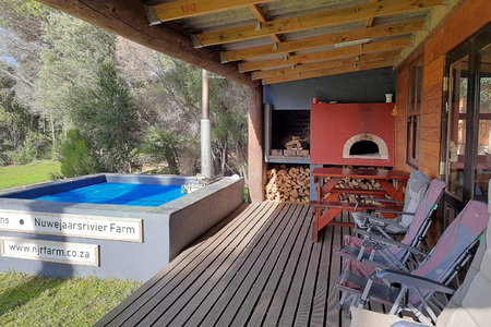 outside_porch_with_pool_pizza_oven_1598353937