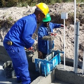 Condoits cast into wall