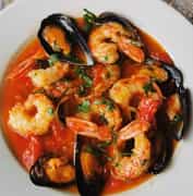 Prawns and Mussels Served with Charred Ciabatta