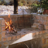 Fireplace - Vleiroos Cottage @ Sandberg Fynbos Reserve - Xplorio™ Gansbaai