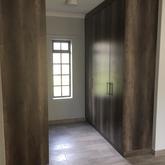 BICs in Monument Oak Melawood Finish - PCF Kitchens - Xplorio™ Pringle Bay