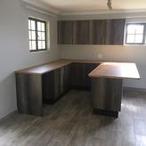 Formica Saxon Oak Tops with Monument Oak Melawood Doors - PCF Kitchens - Xplorio™ Pringle Bay