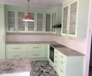 Kitchen with Granite Tops and Pistachio Green Doors and Panels