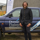 JP With Car - Dormehl Phalane Property Group Overstrand - Xplorio™ Gansbaai 