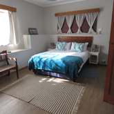 Main bedroom - Caledon Protea Cottage - Xplorio™ Caledon